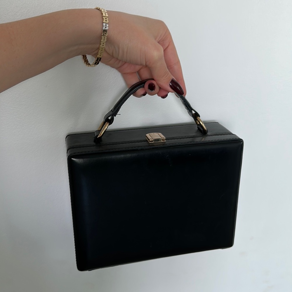 Black and gold square box purse